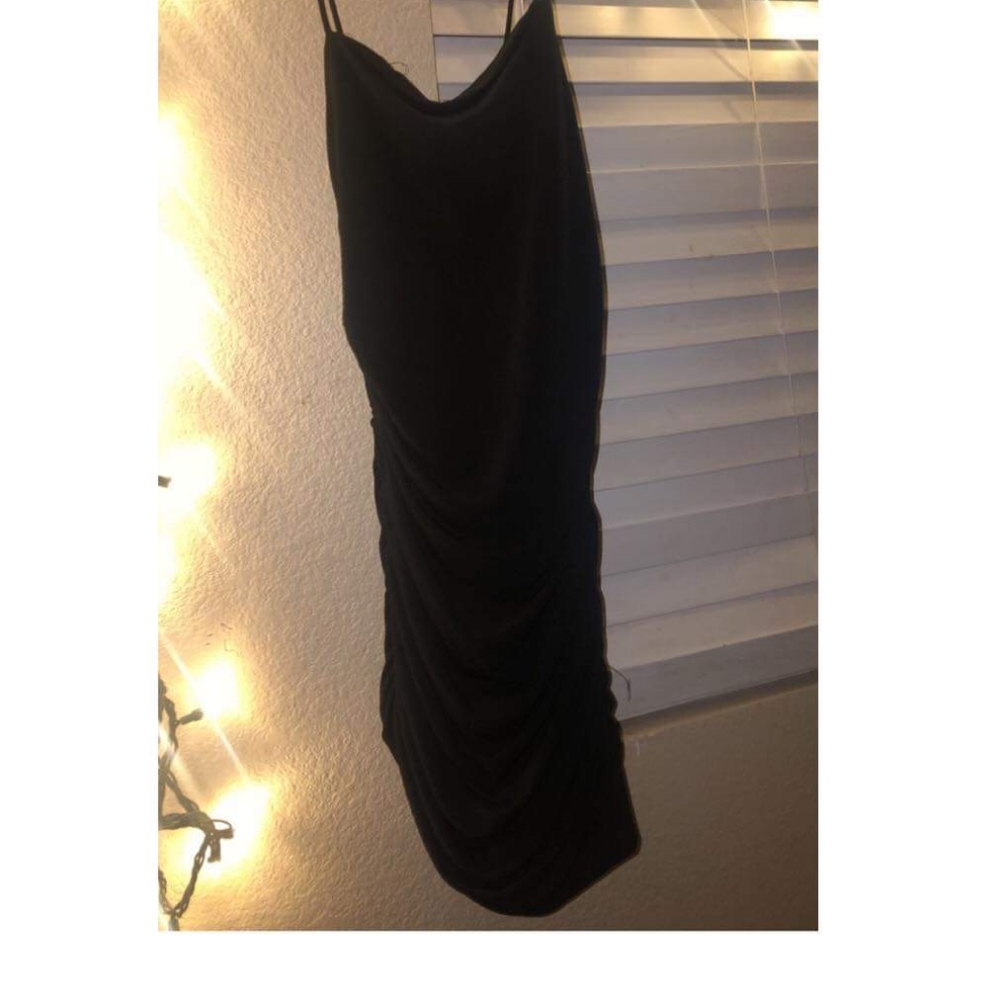 Silky black dress.
